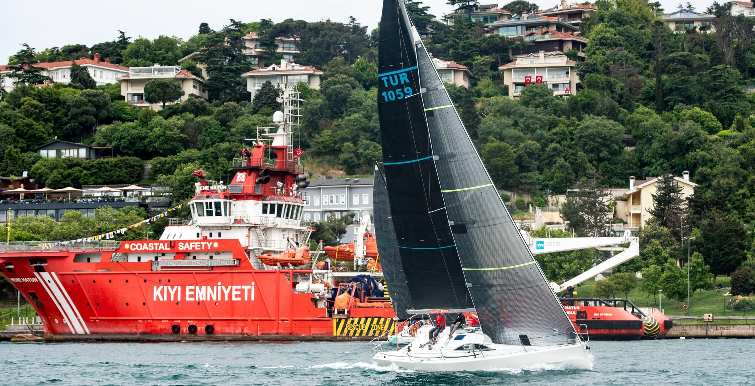 Zacapa racing under a black sail on the Bosphorus.