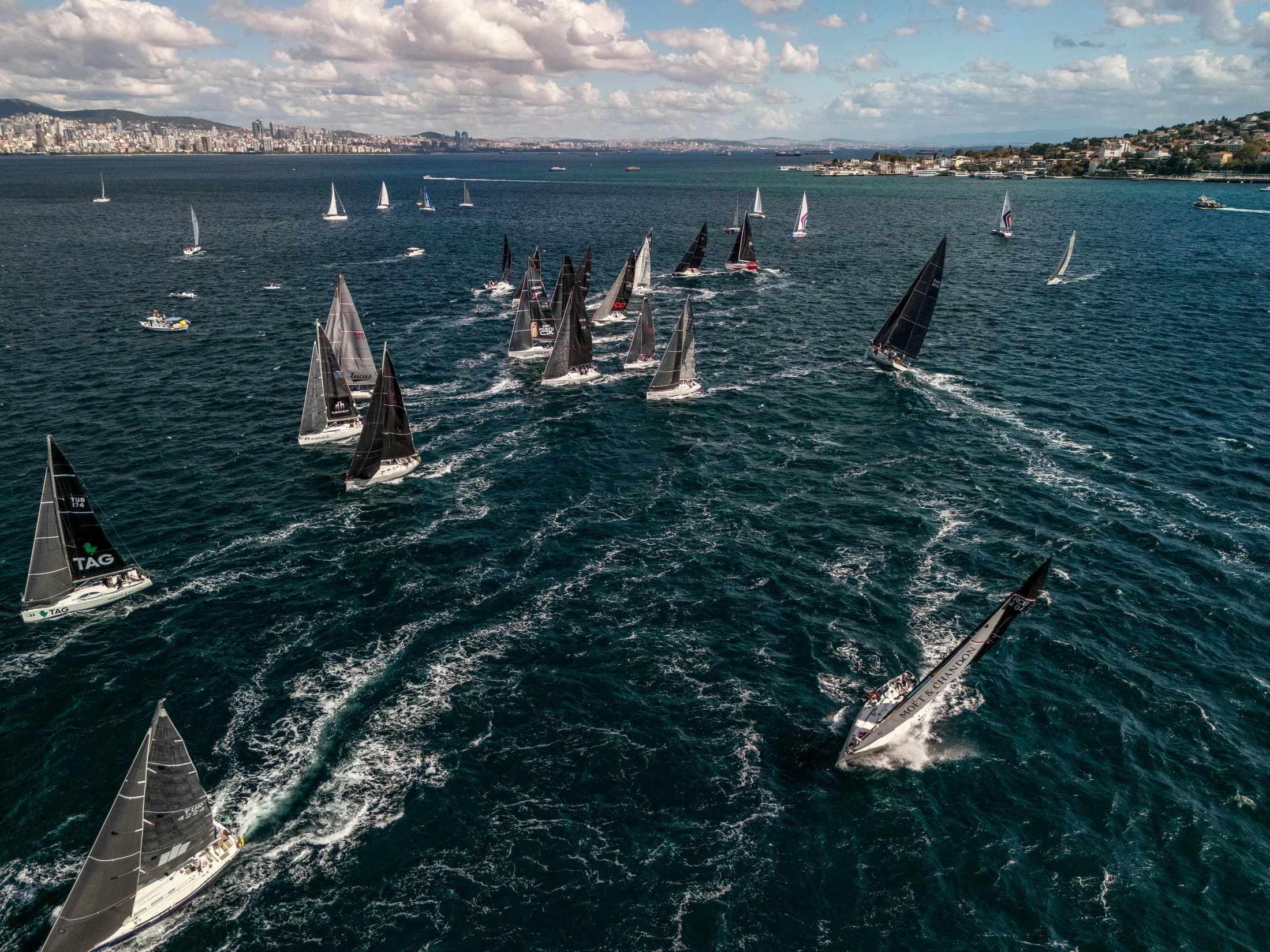 The Bosphorus Cup fleet racing across the strait with Istanbul on the horizon.