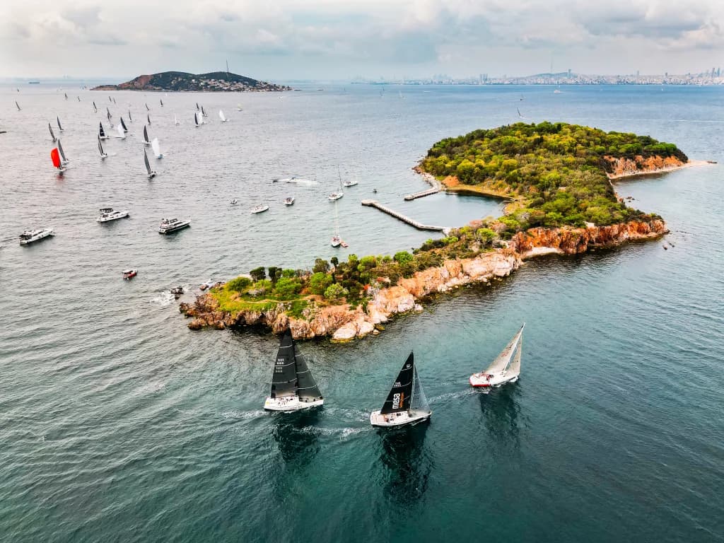 Racing yachts sailing around the Marmara islands during the 2024 Bosphorus Cup.